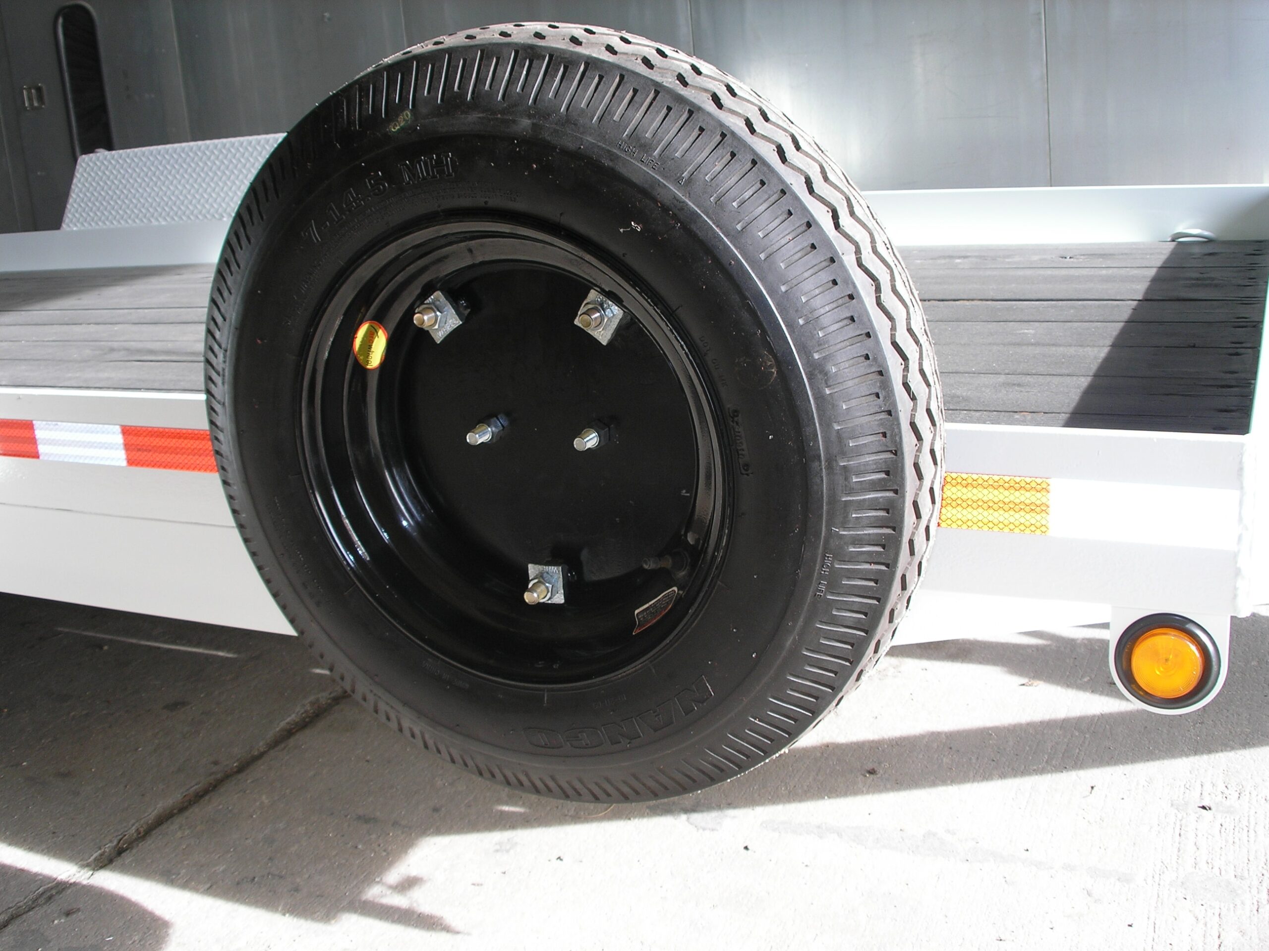 SPARE TIRE ADAPTOR FOR MOBILE HOME WHEEL